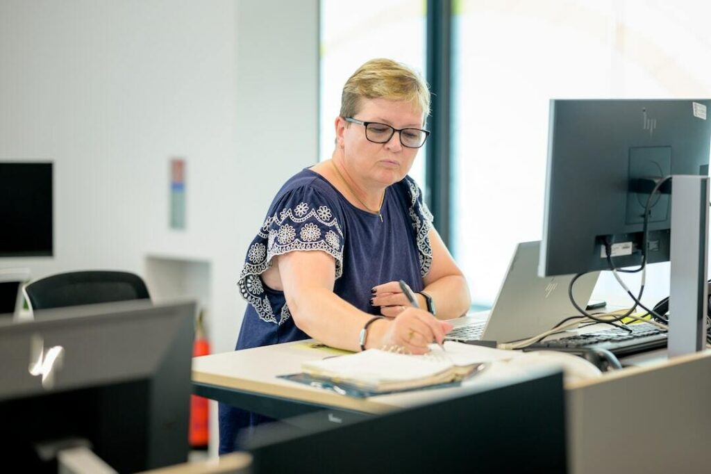 a-bookkeeper-working-at-a-standing-desk